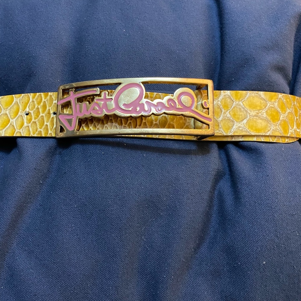Tan faux snakeskin. Metal closure with pink Just Cavalli.